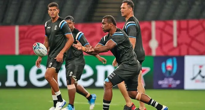 Fiji Airways Flying Fijians (from left) Ben Volavola, Mesulame Dolokoto (partly obscured), assistant coach Tabai Matson and Mosese Voka during a training session in Japan. They are preparing for their final Pool D Rugby World Cup clash against Georgia tomorrow.  Photo: FRU Media