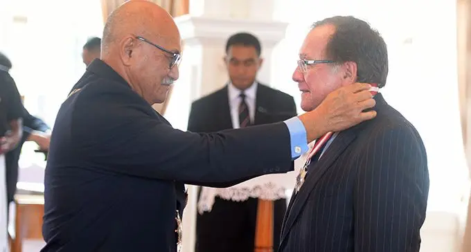 President Major-General (Ret’d) Jioji Konrote awards Companion of the Order of Fiji (CF) medal to Murray Stuart McCully during the investiture ceremony at State House on July 12, 2019.  Photo: Ronald Kumar.