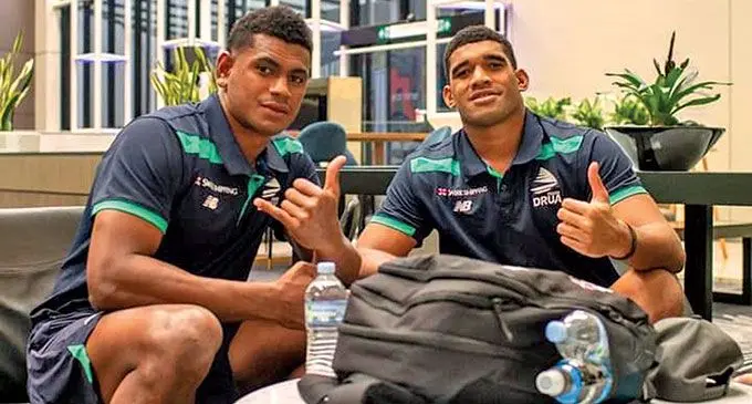 From left: Swire Shipping Fijian Drua reps Kitione Salawa, with captain Meli Derenalagi. Photo: Aroha Photography