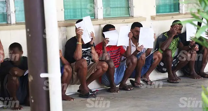Some of the men who appeared in court on April 9, 2020 for breaching the nationwide curfew. Photo: Kelera Sovasiga