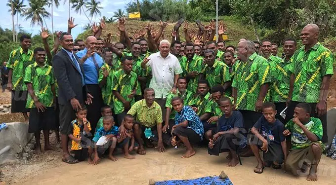 He is pictured here with villagers and stakeholders at the commissioning on September 29, 2020.
