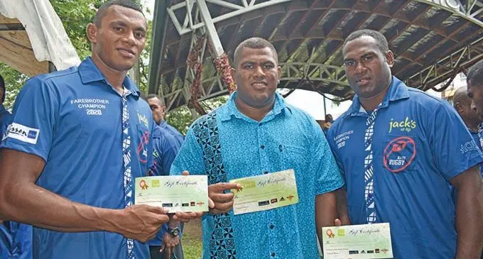 Members of the Jacks Nadi rugby team Vilive Miramira, Tuvere Vugakoto and Apisai Nagi with their awards during the presentation at the Nair Dias, Nadi yesterday. Photo: WAISEA NASOKIA