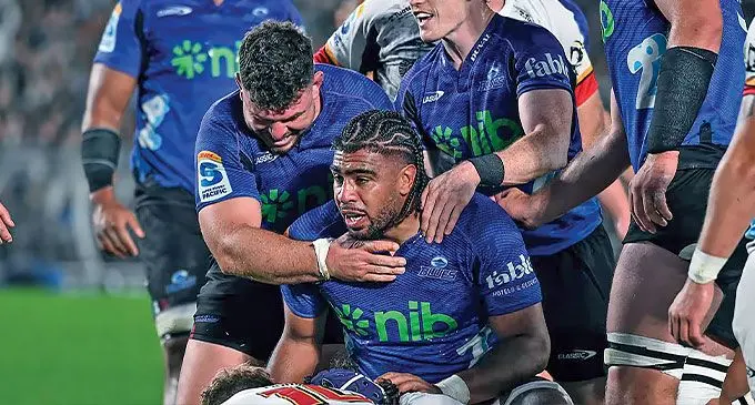 The Blues celebrate a try for Hoskins Sotutu against the Chiefs. Photo: Photosport