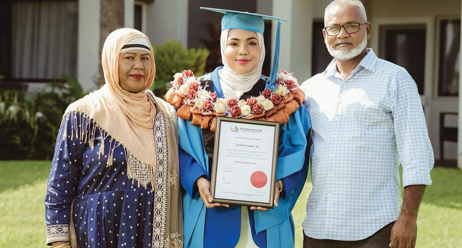 University of Fiji law graduate, Nasibah Naznin Ali is flanked by mum, Nazra Bi and her dad Amzad Ali.