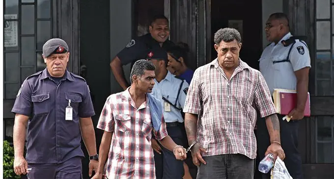 Accused Kolaia Nabaro with a Police officer at the Nadi Magistrates Court on February 20, 2019. Photo: Waisea Nasokia