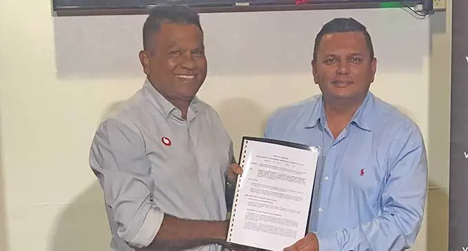 Head of e-commerce and digital financial services at Vodafone Fiji's M-PAiSA, Shailendra Prasad (left) and Damodar Group chief executive officer, Div Damodar, during the launch of the Wednesday Blockbuster Movies with M-PAiSA promotion at Damodar City, Suva on March 4, 2024. Photo: Jonathan Bryce