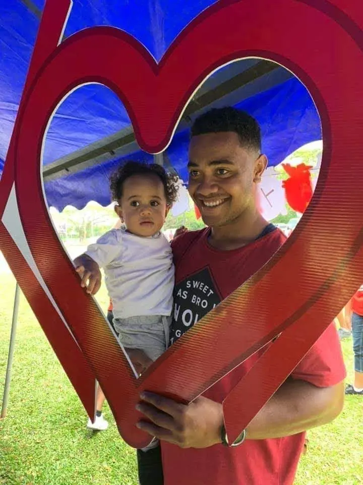 Iowane Cavuilati at a RHD booth during World Heart Day celebrations.