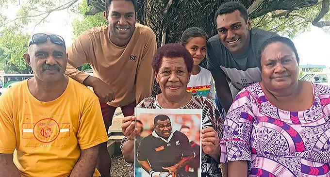 Sitting from left: Lemeki Toutou, late Joeli Vidiri’s Mum Alumeci Naqera (with photo), Mereseini Nakevu, standing Kalaveti Toutou, Miriama Narara, and Joeli Vidiri in Nadi on March 3, 2022. Photo: Waisea Nasokia.
