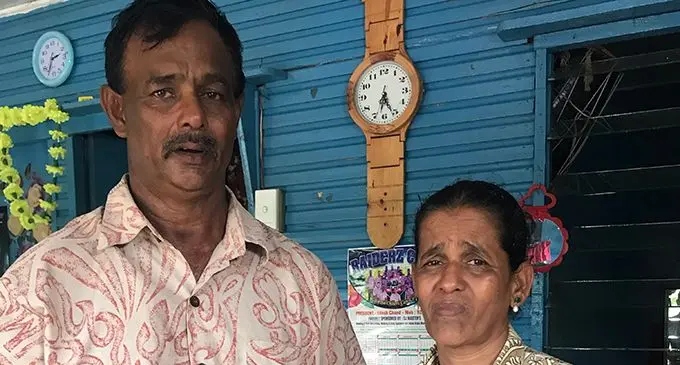 From left, Jack Prasad holding a picture of his late son Bimlesh Prasad with his wife Urmila Devi. Photo: Laisa Lui