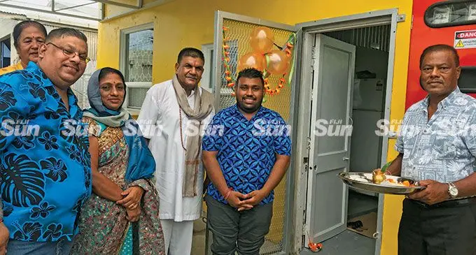 From left: Saten Kumar (father), Uma Chand(aunt), Kushna Devi (mother), pundit Rajesh Pande Maharaj, Om Prakash Kumar, Satish Chand(uncle) after the religious rituals for the opening of OM’s Kitchen at Ackland Street, Vatuwaqa, on March 24,2022. Photo: Laisa Lui