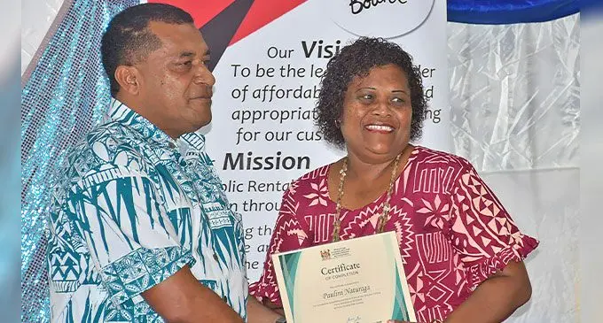 Minister for Housing and Local Government Maciu Nalumisa with Paulina Naturaga.