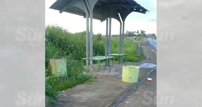 Rubbish at the bus stop despite the two rubbish bins provided. Photo: Shalveen Chand