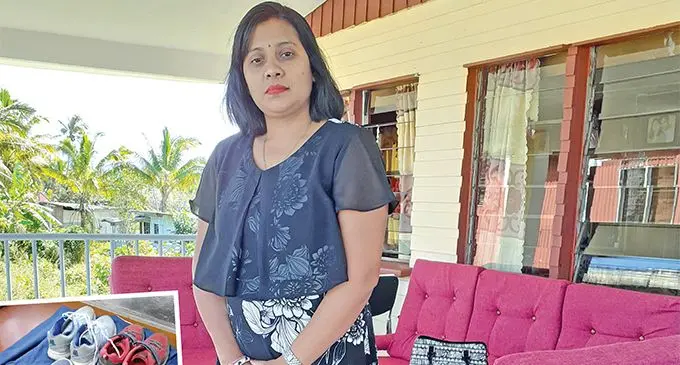 Sherly Kumar standing in their porch where the burglary took place. INSET: The shoes recovered from the boy. Photo: Ronald Kumar