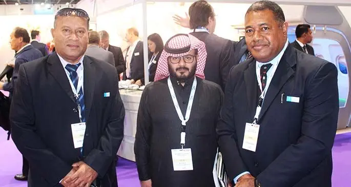 Joji Luita (left), Mohammed Al Qahtani Saudi Aramco and Kelepi Abariga (right) at a Middle East Aviation Expo in Dubai.