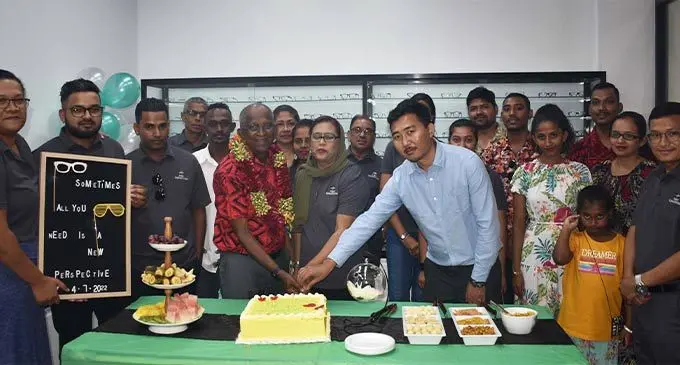Asgar Optometrists General Manager Vidhya Lakhan (in garland) with Nadi staff during company celebrations in Nadi. Photo: Waisea Nasokia