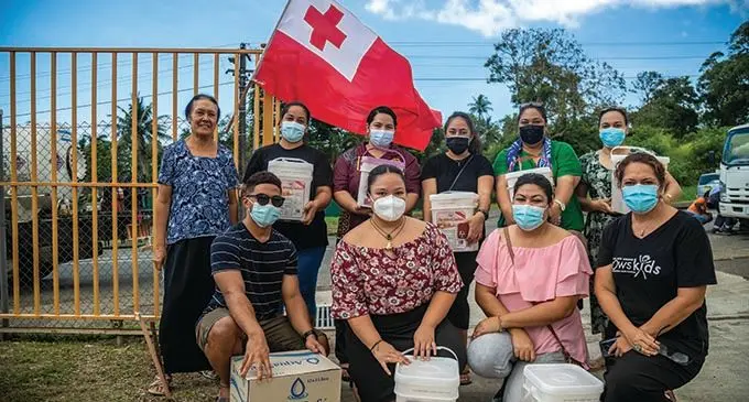 Members of the Tongan community in Fiji during the Tonga Volcano Bucket Drive (back from left) Ana Fa, Poulia Misi, Sifoni Fetu’u, Vanesa Veamatahau, Luisa Vailanu and Makeleta Napa’a. Front row from left: Vunivalu Siale, Joy Kami, Esiada Tatu and Sina Kami in Suva on January 24, 2022.   Photo: Leon Lord