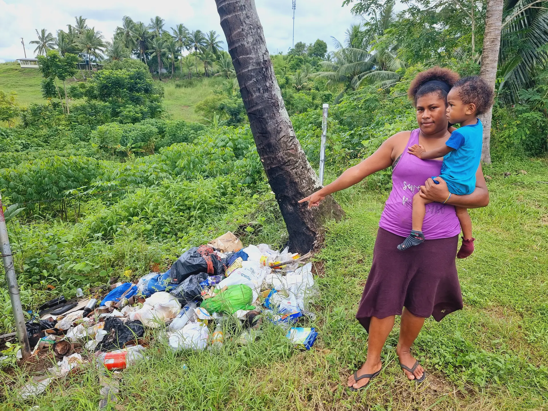 Lowcost Bulileka resident, Emali Vodre, shows the pile of rubbish and believes Labasa Town Council should provide garbage collection services. 