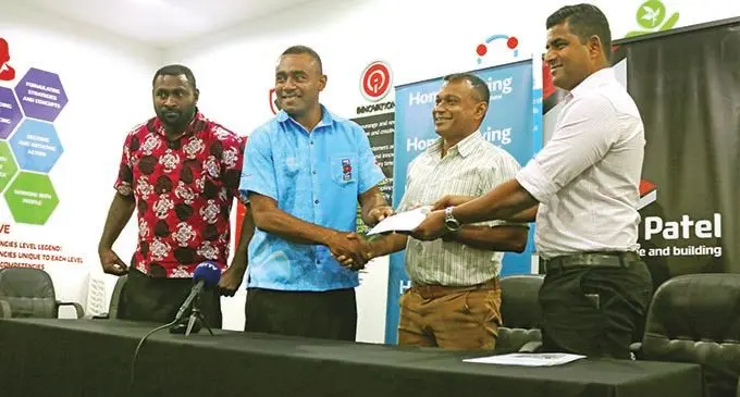 Second from left: Nacanieli Radravu of Suva Rugby Union receives the cheque from Neelesh Singh, general manager Vinod Patel and Ronald Narayan, general manager Home & Living in Suva on  March 3, 2021. 