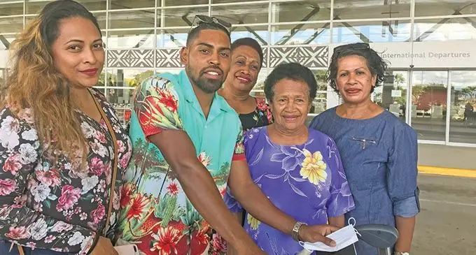 From left: Naziah Ali and Roy Krishna with family members at Nadi International Airport on September 24, 2020.  Photo: Waisea Nasokia   