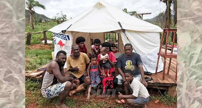 Maciu Rokotora (left) with his uncles Apakuki Bolamaisei, Samisoni Vananikuila (right) and family members in Valebasoga, Labasa, on January 8, 2021. Photo: Shratika Naidu