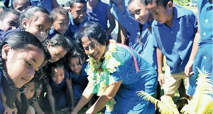 The First Lady Sarote Konrote with students of Motusa Primary School supporting Government’s Plant Four Million Trees in Four Years initiative. Photo: DEPTFO News
