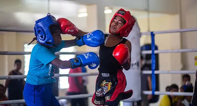 Girls boxing between Nawaka’s Vacinta Lata (left) and Lita Kolitapa of Butterfly Boxing Club of Suva during the Fiji Amateur Boxing Association’s junior exhibition match at the Commander Stan Brown Gym in Walu Bay, Suva, on April 2, 2022. Photo: Leon Lord