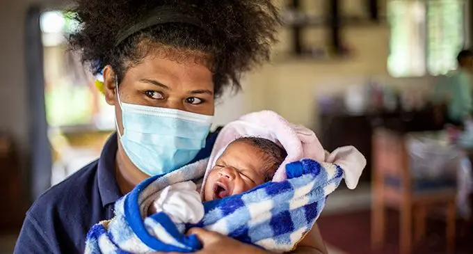 HAPPY and WELL. .. Naomi Kubulala is reunited with her newborn son, Eroni Lagi Kavikaleka Kubulala.  Photo Leon Lord 