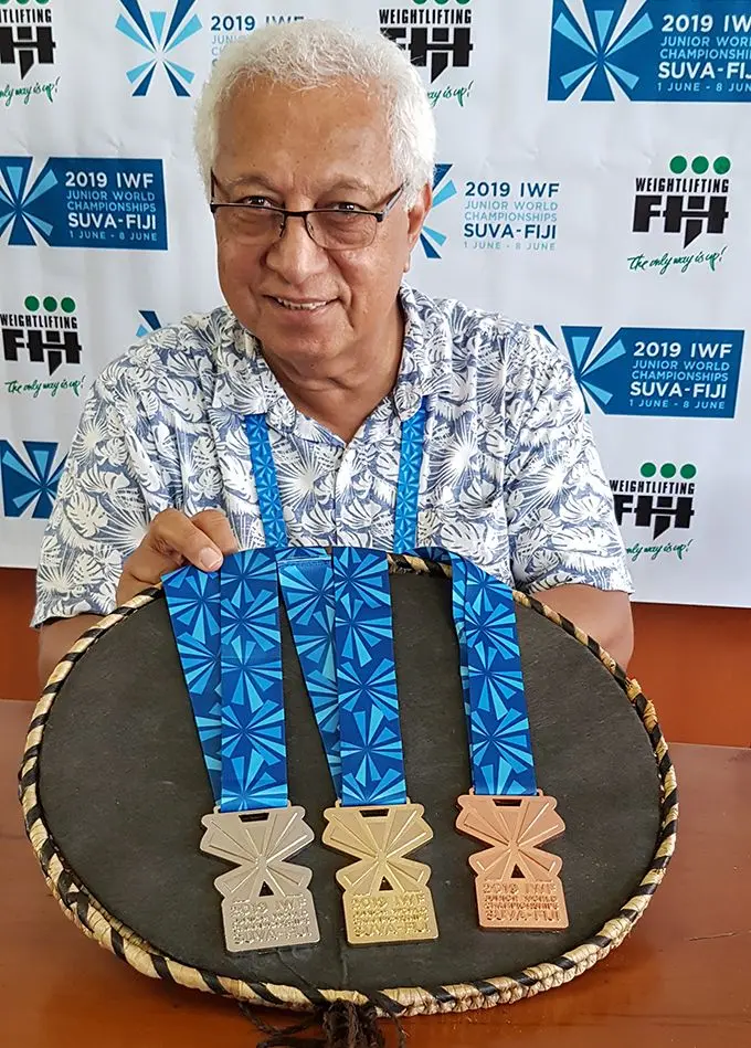 Junior Weightlifting Championship  organising commitee chair Dr Robin Mitchel with the medals on May 30,2019. Photo: Weightlifting Fiji