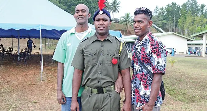 From left: Dad Ratu Aca Vitikawalu, Baton of Honour recipient and son Ratu Samuela Bolakuruvaki, with brother Timoci Vatureba after the Montfort Boys Town passing-out parade at the school ground on July 26, 2019. Photo: Simione Haravanua