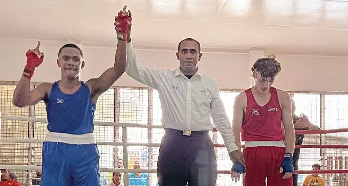 From left: Iokimi Navuasese’s hand is raised after his points win over Garrica Bonnaci of Victoria, Australia, at the Captain Stan Brown Boxing Gym on November 22, 2024. Photo: Sereana Salalo