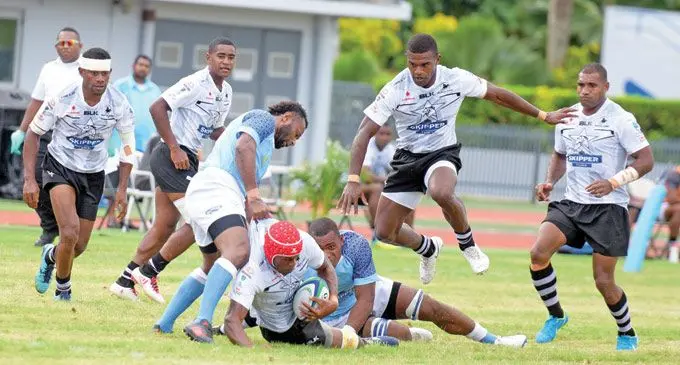 Nadroga flanker Mosese Tui (with ball) in action against Suva during  the Skipper Cup Premier at Suva’s ANZ Stadium on May 4, 2019. Photo: Ronald Kumar