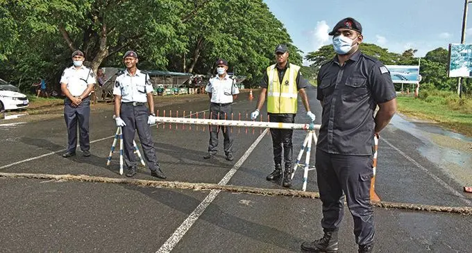 Police officers monitor check-points of entry at Momi Junction in Nadi. Photo: Mereleki Nai