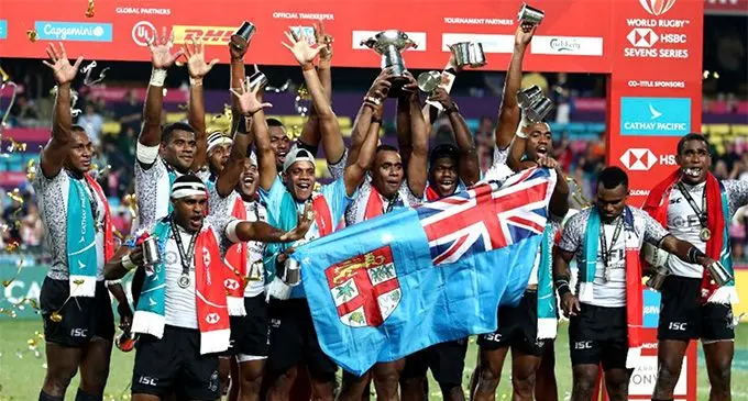 History makers... the Fiji Rugby 7s side celebrate after beating France in the Hong Kong 7s final 21 - 7.