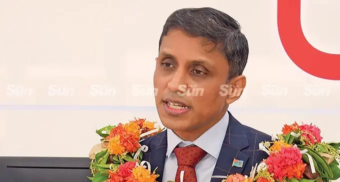 Permanent Secretary for Commerce, Trade, Tourism and Transport Shaheen Ali speaking at the opening of the new Digicel outlet at TappooCity Suva. Photo: Ronald Kumar