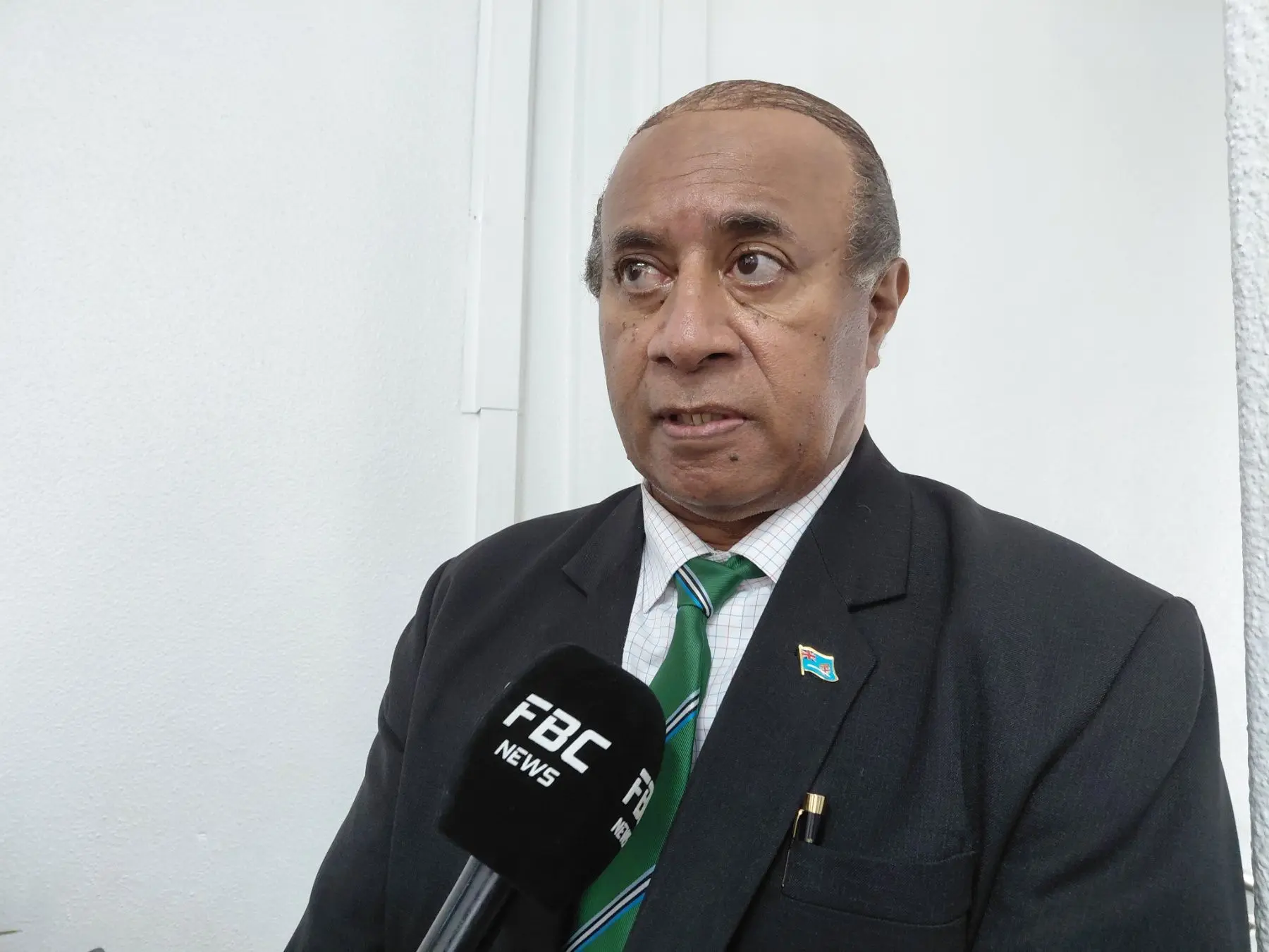 Minister for Public Works, Transport and Meteorological Services Ro Filipe Tuisawau speaks to reporters in Parliament on November 4, 2025. 