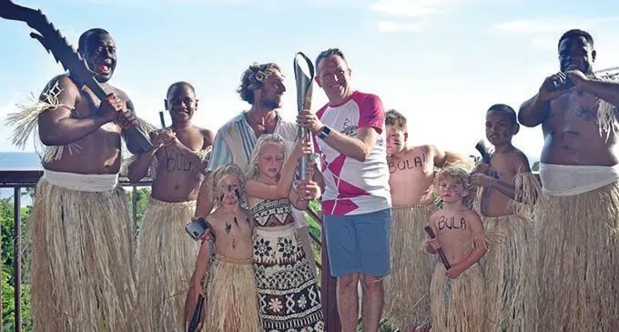 Outrigger Fiji Beach Resort general manager, Darren Shaw (sixth from left) with resort guests and resort staff happily receiving the Birmingham 2022 Queen’s Baton Relay at the resort on February 13, 2022.   Photo: Nicolette Chambers