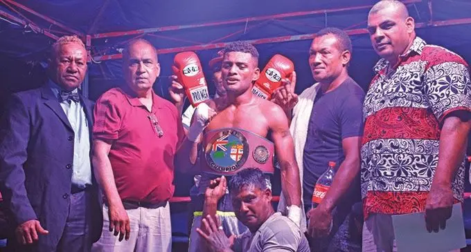 New Fijian super welterweight champion Jese Ravudi (centre) with South Pacific Boxing Promotions director Mohammed Shameem (second from left) at Prince Charles Park, Nadi on October 26, 2019. Photo: Waisea Nasokia