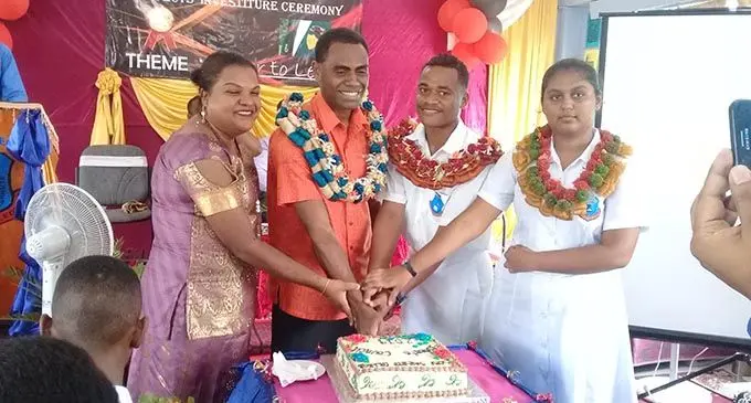 From Left: Principal of Sabeto College Shelly Imran cuts the Prefects’ Induction cake with the chief guest Ratu Iosefo Roragaca Rovereivalu, head boy Ratu Penioni Buatavatava and the head girl Joytika Chandra at the Prefects’ Induction on February 8, 2019. Photo: Sabeto Central College 