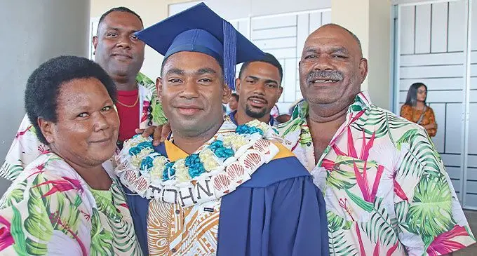 Back, from left: Waisale Rokovoli and Luke Ketewai. Front, from left; Mother Reapi Ului, John Speight Ravula and father Ilisoni Ravula. Photo: Sosiveta Korobiau