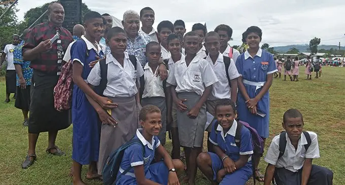 Prime Minister Voreqe Bainimarama with students from Navosa during the Government Services Expo at the Vatumali Government Station in Keiyasi, Navosa, on April 9, 2019 Photo: Nicolette Chambers