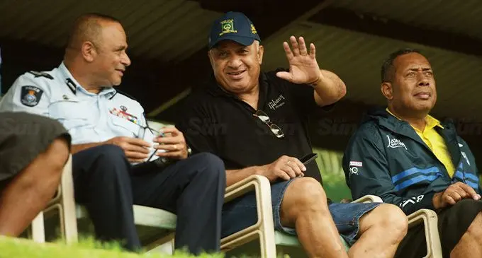 From left: Commissioner of Police Brigadier-General Sitiveni Qiliho, Prime Minister Voreqe Bainimarama and Commander of the Republic of Fiji Military Forces Major-General Ro Jone Kalouniwai share a light moment while watching the fifth round of the Bainimarama Competition at the Queen Elizabeth Barracks ground on August 17, 2022. The Force Training Group (FTG) team won the match against Headquarters Land Force Command (LFC) 27- 24. Photo: Ronald Kuma