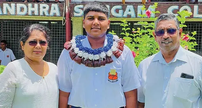 From left: Mum Nayoma Sandayani, Ravidu Rathnaweera, and Dad Anura Rathnaweera. Photo: Waisea Nasokia