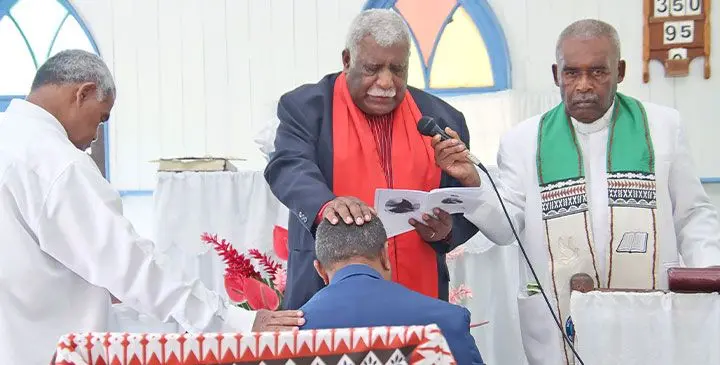 Former president of the Methodist Church, Reverend Ili Vunisuwai (middle), conducted the dedication service, offering prayers and blessings for the new paramount chief. Photo: Ministry of iTaukei Affairs