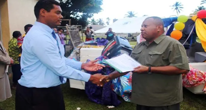 Minister for Rural and Maritime Development and Disaster Management Inia Seruiratu officially hands over the new boat to Provincial Administrator Lomaiviti Asesela Biutiviti at Levuka, Ovalau.