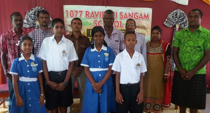 Front from left:  Rishita Lal (deputy headgirl), Shamal Prasad (headboy), Shreya Sen (headgirl), Iliesa Qele (deputy headboy), with staff, management and community representatives. Photo: Karalaini Tavi