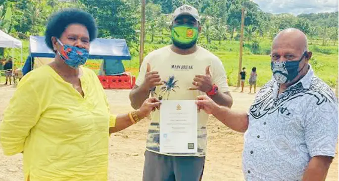 Apisai Moce with his Bachelor’s Degree from the University of Armidale in Australia is supported by his parents Vasiti Valatia Vauvau and Sosiceni Moce.