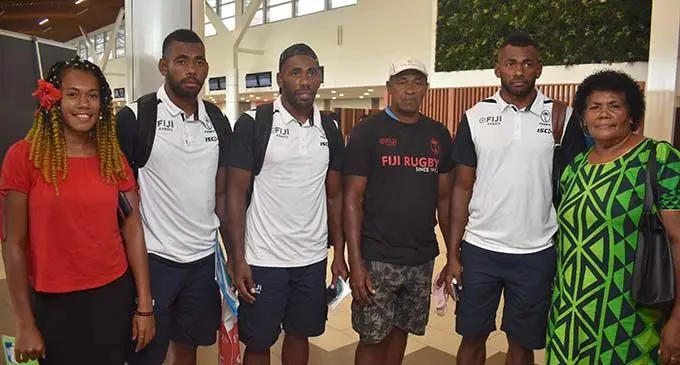 From left: Bau Tabu (sister), Fiji Airways Fijian 7s reps Isoa Tabu, Kavekini Tabu, Sanaila Tabu (father), Sevuloni Mocenacagi and Merelita Dakua (mother) at the Nadi International Airport on November 28, 2019. Photo: Waisea Nasokia