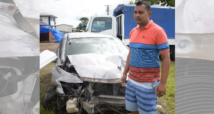 James Avinesh Singh at his car with stones in the back. The car was stolen and used in a robbery, then abandoned in Cunningham, Nasinu, following a crash on August 20, 2019.  Photos: Ronald Kumar