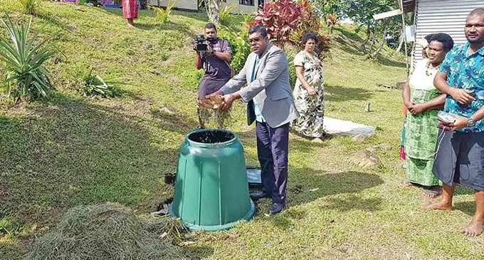 Minister for Waterways and Environment Dr Mahendra Reddy with the compost bin donated to Nabouwalu Village, Bua on June 10, 2022. Photo: Ministry of Waterways and Environment  