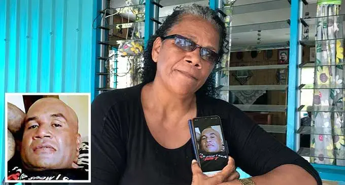 Nunia Rokomalani holding a picture of his late brother Semi Vetaukula at their home in Wainibuku on October 3, 2022. Photo: Wati Talebula-Nuku